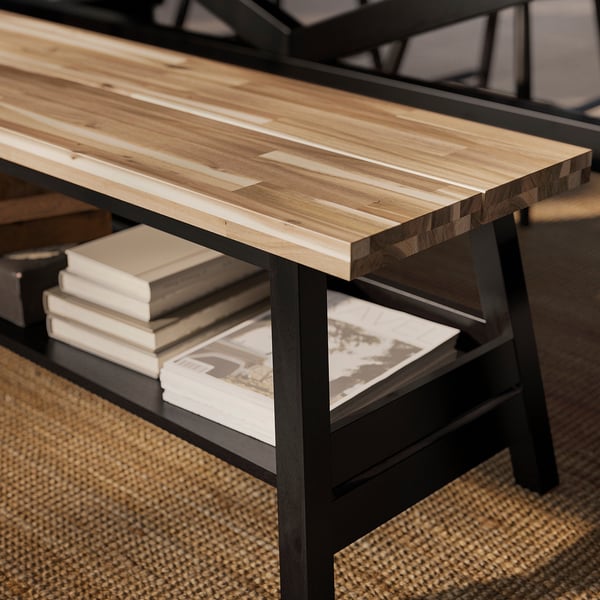 SKOGSTA Bench with storage, acacia/black, 120 cm