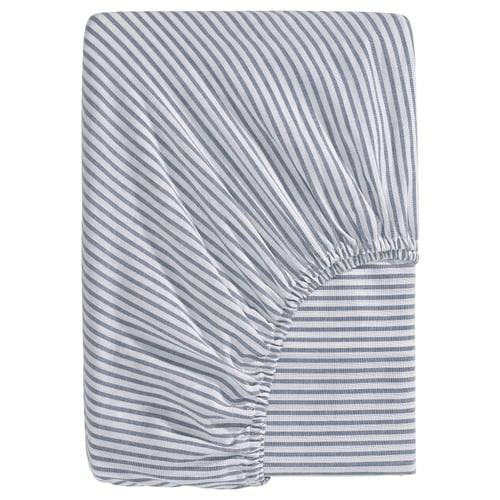 This image shows a SOLFIBBLA blue and white striped fitted sheet made of recycled cotton.