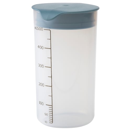 A clear plastic container with teal lid, marked with measurement lines, used for mixing and storing shakes or batters.