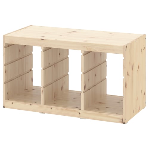 The TROFAST wooden storage unit in light pine, characterised by its rectangular shape and open compartments.