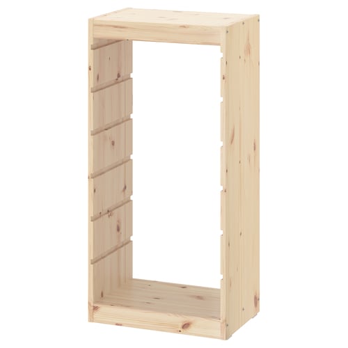 An ikea TROFAST light pine wooden storage frame, rectangular, for organizing childrens items.