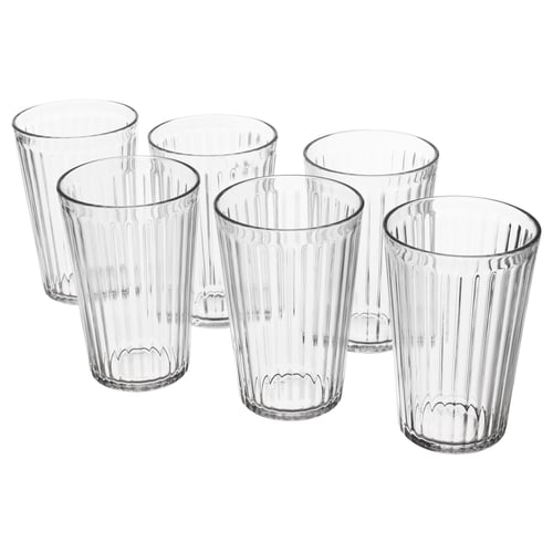 Six clear, ribbed glass cups with a scalloped bottom sit empty. VARDAGEN, transparent, cylindrical, with vertical ridges, durable tempered glass.