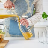 KORKEN Balang berpenutup berbentuk botol, kaca jernih, 1.4 l