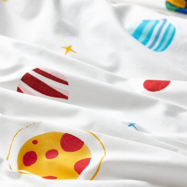 Soft, colorful space-themed duvet cover; bright planets, stars on crisp white cotton blend.