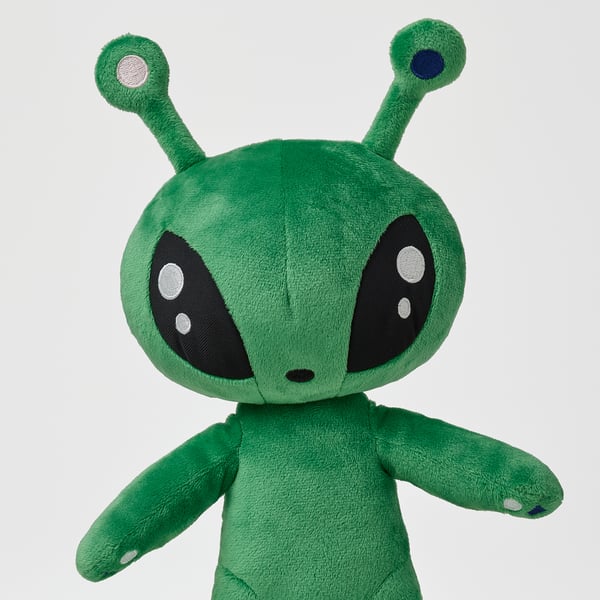 Soft, plush alien toy with large black eyes, two antennae, and a friendly gaze. Made from recycled polyester, perfect for childrens hugs.