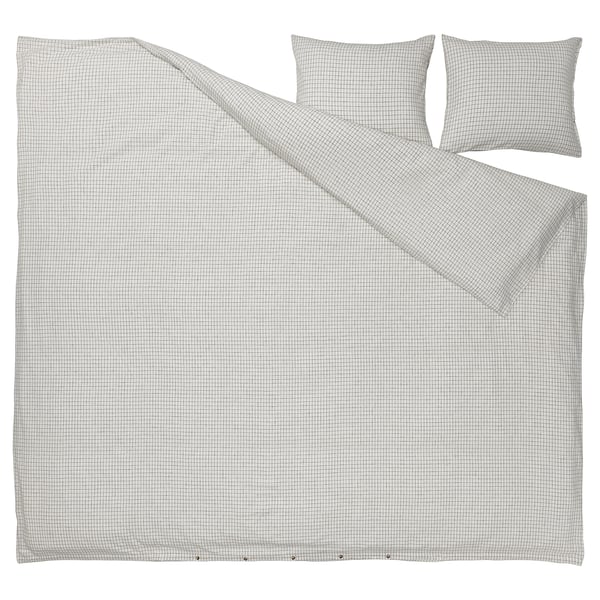ÅKERFIBBLA bedding set, white-black checkered, soft cotton/linen, rectangular with creased texture.