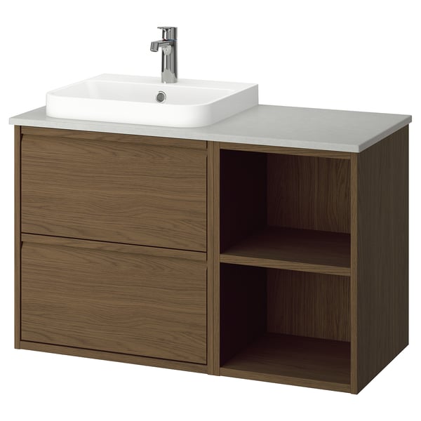 Modern wooden bathroom vanity with white countertop, sink, and open shelving.