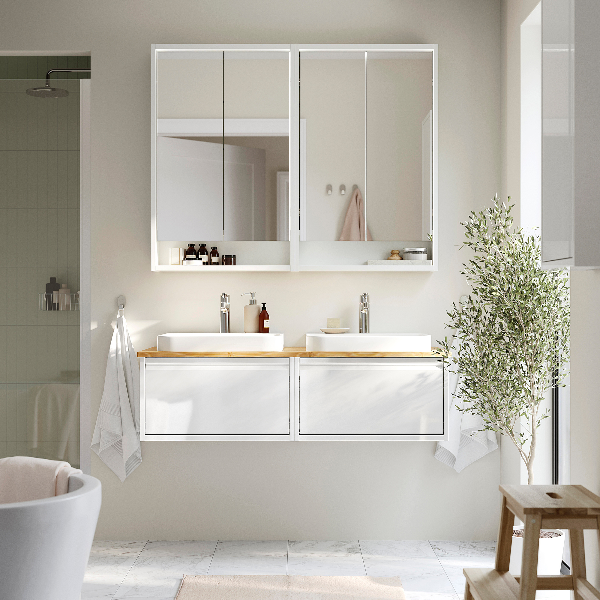 Modern white double bathroom vanity with marble sinks, large mirrors, and wooden countertop. Large and centrally located in the bathroom.