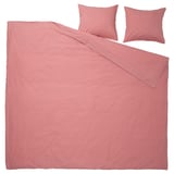 This image shows a pink cotton duvet cover set, including one large square duvet cover and two matching square pillows. The design is simple and soft.