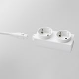 White electrical extension cord with dual outlets and a connected plug. Indoor, flexible power solution.