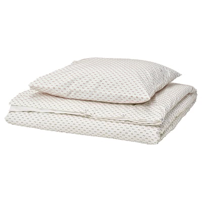 A BANDKNIPPE duvet cover set in beige and white with subtle woven details, made of soft 100% cotton.
