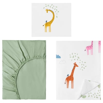 Giraffe bedding set: light green duvet cover, yellow & orange giraffes on white wall stickers.