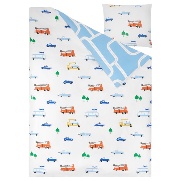 Kids duvet set with colorful vehicle designs on white. Soft cotton; includes duvet cover and pillowcase.