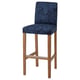 The BERGMUND barstool a navy paisley seat, wooden legs, and a high back for comfort.
