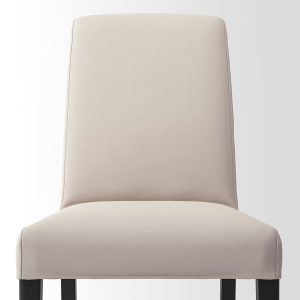 Modern dining chair with high backrest, soft beige cover, and sturdy wooden legs, designed for comfort and style.