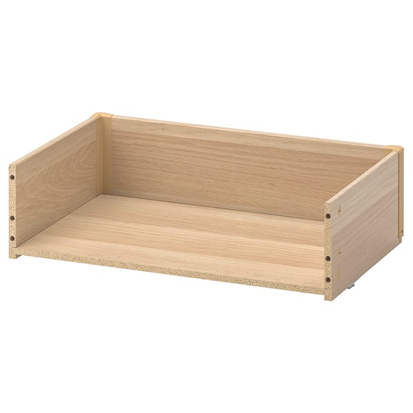 Light wood BESTÅ drawer, simple design, rectangular shape, made of particleboard.