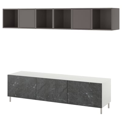 A modern BESTÅ tv unit in white and black marble. It a low cabinet with drawers and an open shelf unit above.