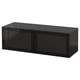 Black BESTÅ storage unit: modern boxy shape, glossy finish, sliding glass doors, metal & glass frame.