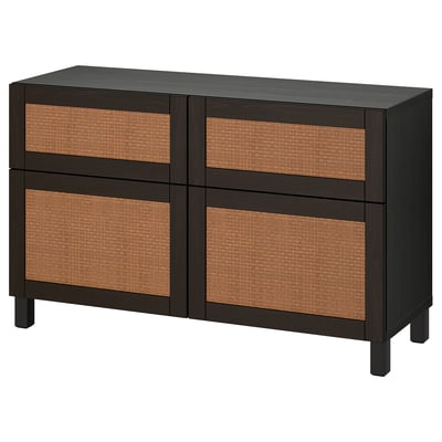 An ikea BESTÅ sideboard in dark brown with woven fronts, featuring four drawers and doors.
