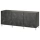 Option: A black marble-textured BESTÅ sideboard with three doors and stainless steel legs. Its sleek design offers ample storage and display space.