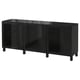 Black BESTÅ cabinet with glass doors and black legs.