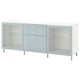 A white BESTÅ sideboard with glass doors and a central drawer. It a sleek, modern design with adjustable shelves.