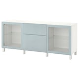 An ikea BESTÅ white and light blue sideboard with glass doors and adjustable shelves.