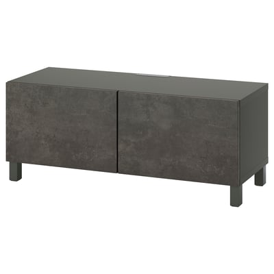 Dark grey, modern tv bench with two doors and square legs.