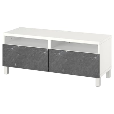 A white BESTÅ tv stand with two shelves and marble-patterned drawers. Modern design with clean lines and cable management.