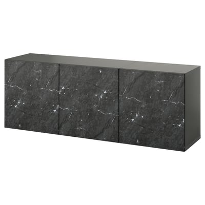 Black BESTÅ sideboard with three sleek, dark marble-effect doors, offering modern storage.