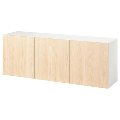 A white and light wooden BESTÅ wall-mounted cabinet with four doors.