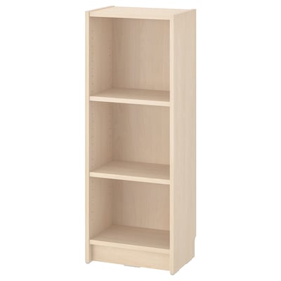 A BILLY bookcase in white. Made of particleboard and fibreboard, it three adjustable shelves and a simple, minimalist design.