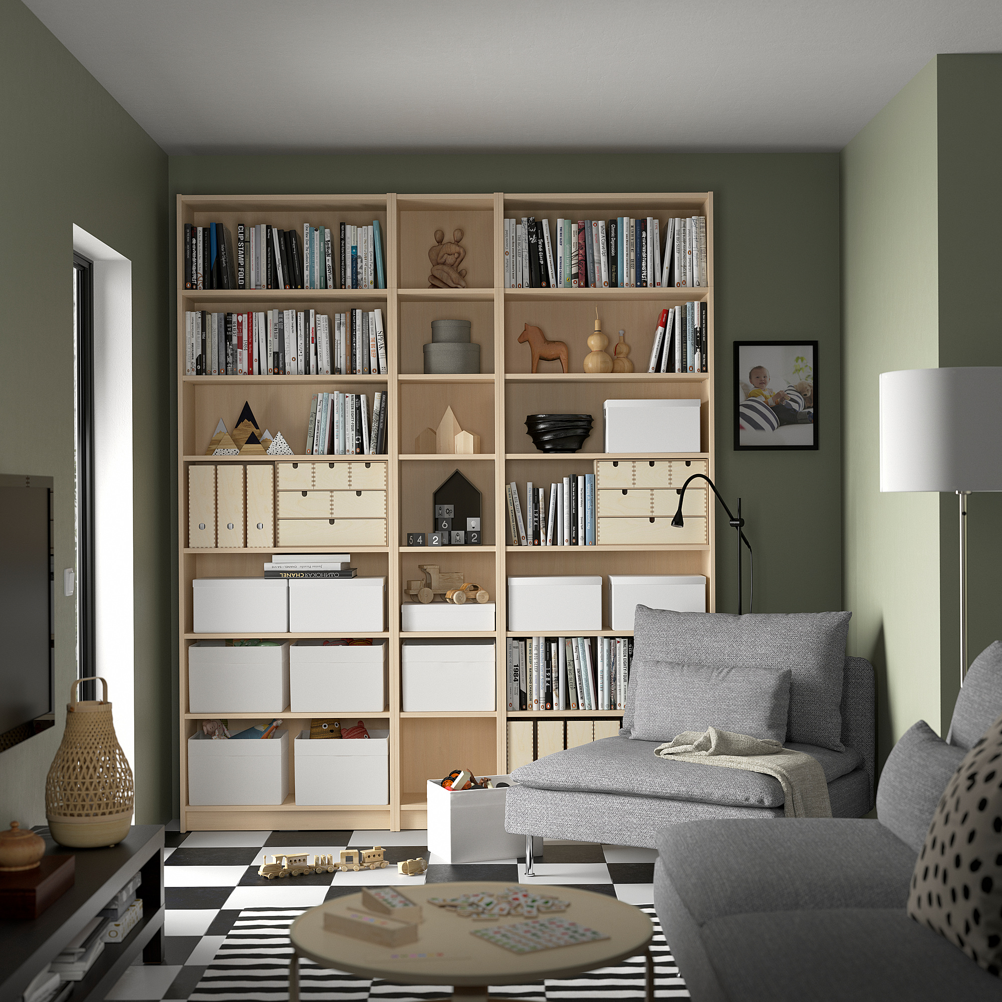 BILLY bookcase with books and decor in cozy living space.
