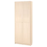 A BILLY bookcase in light beige, featuring two doors and adjustable shelves, made from particleboard and paper foil.