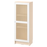 An ikea BILLY bookcase with a white and bamboo woven door. Its tall, rectangular, and includes a single door with a natural, textured bamboo panel.
