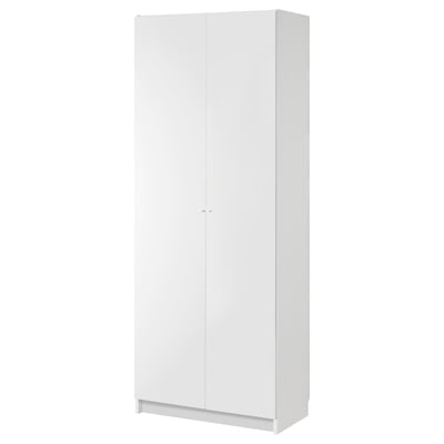 A white BILLY bookshelf, slim and rectangular, with smooth surfaces and concealed storage behind a panel door.