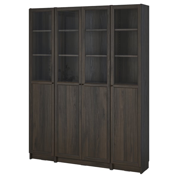 Dark grey BILLY bookcase with glass doors minimalist design, wood texture, adjustable shelves.