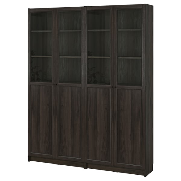 Dark wood BILLY bookcase with glass doors, six shelves, classic design.