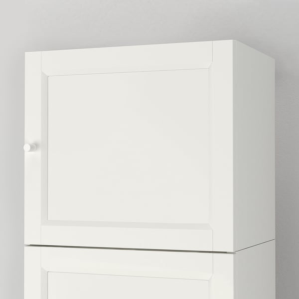 Modern white cabinet with clean, smooth finish and simple lines.