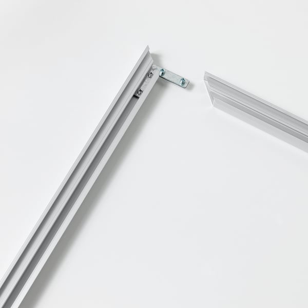 Close-up of sleek, modern frame corner with secure metal joints.