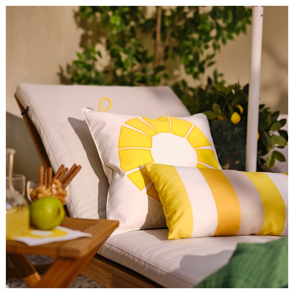 Brighten up outdoors with BRÖGGAN yellow pineapple cushions - large, striped, & sun/water resistant.