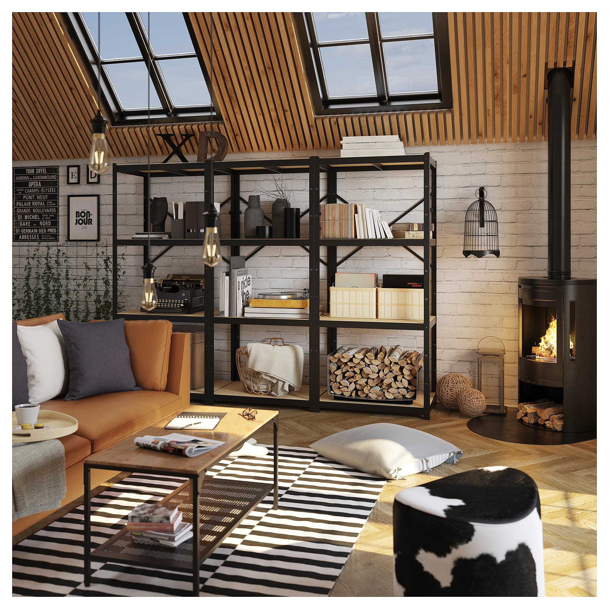 Cozy living room with black BROR bookshelves, leather orange sofa, striped rug.