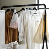 Clothes hanger with grooves holds various garments, preventing them from sliding off.