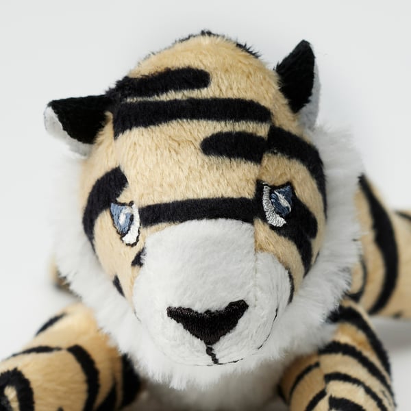 Stuffed tiger toy, soft and huggable, made from recycled polyester. Embroidered details for safety, perfect for childrens play.