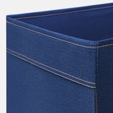 Blue denim-textured storage bin with yellow stitching; corner close-up shows quality fabric and sewing.