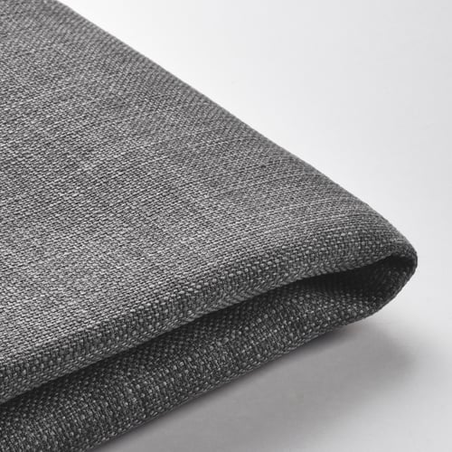 Dark gray fabric close-up, smooth texture, woven pattern visible, folded neatly.
