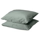 Two square, grey-green DVALA cotton pillowcases stacked neatly, simple design.