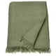 Green DYTÅG throw, fringe ends, soft linen-cotton blend.