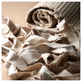 ENERGIKÄLLA rug: off-white, handwoven cotton, irregular strips, unique design.