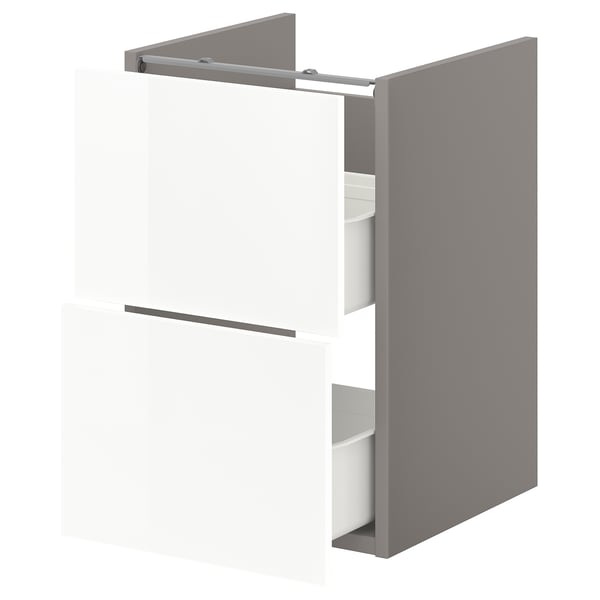 An ENHET white bathroom cabinet with two drawers. It has a modern, glossy finish and is 40 cm wide.